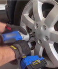Using Bolt Nut Extractor Set Heavy Duty Metric Eight To Twenty Seven Millimeter With Impact Lug Removal Tool on wheel