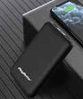 PlayBetter bundle power bank shown charging a smartphone, part of Tread 2 Overland Edition Off-Road GPS Navigator For Tough Terrain