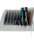 Dope Heavy Duty Six Pack Laptop And Tablet Charging Station With Versatile Desktop Organizer Rack For Up To 15 6 Inch Chromebook MacBook Surface Pro Tech Rig, showcasing charging tablets and laptops in gray rack.
