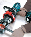 Makita Xcs01t1 18V Lxt Lithium Ion Cordless Rebar Cutter Kit cutting rebar, equipped with adjustable stopper and rotating blade.