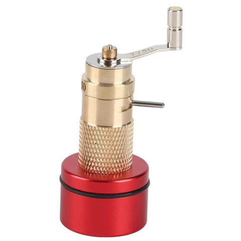 Brass mainspring winder from Mainspring Winder Set With Storage Box For Watches, showing knurled handle and red base.