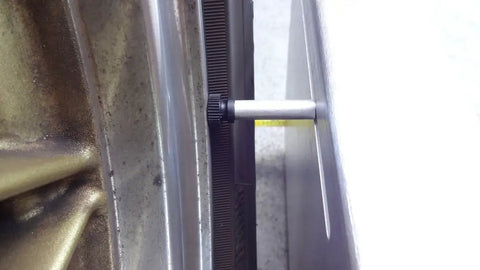 Close-up of Heavy Duty 2 Wheel Alignment Tool For Camber Caster And Toe with precision standoff measuring wheel angles.