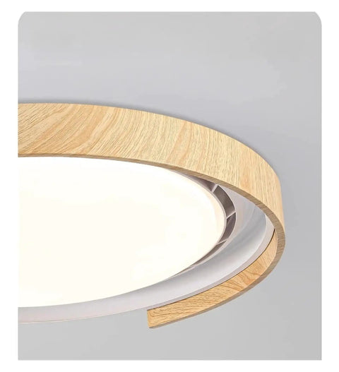 Chandelier Light, Modern Invisible Ceiling Fan with Light for Bedroom, Acrylic Bladeless Wood design, close-up view of wooden edge.