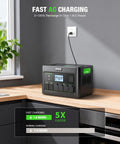 Power Beast 2400W Portable Power Station With 2x100W Solar Panels 1843.2Wh LiFePO4 Battery on kitchen counter charging