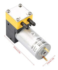Compact Mini Diaphragm Vacuum Pump 24V DC Pulling Dead Simple Suction At One Liter Per Minute, yellow and silver motor design.