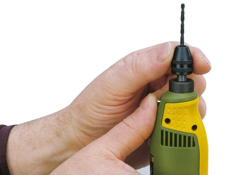 Close-up of Versatile Precision Rotary Tool with Full Wave Speed Control and Soft Grip Dual Material Handle being operated by hand.