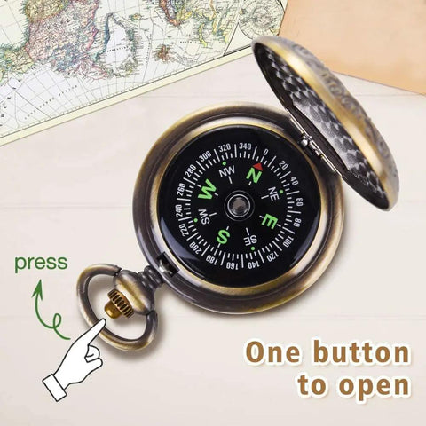 Open bronze compass from Kid Friendly Pirate Telescope And Compass Kit, shown with lid open, retro style, plastic material
