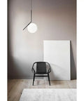 Room with Glass Spherical Pendant Light With Black Iron Frame And White Glass Globe Adjustable Cable Up To 58.9 Inches UL Certified.