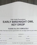 Front view of a white 6x9 key-drop envelope with vehicle info form and signature fields