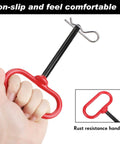 Hand holding 8 Pack Three Eighths By Four Inch Locking Trailer Hitch Pins With Clips And Handles, showing red handle and clip.