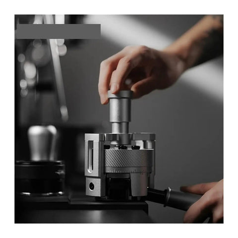 Hit Your Sweet Spot With This Heavy Duty Wdt Needle Distributor Engineered For 58mm Espresso Portafilters To Crush Stubborn Clumps And Elevate Your Roast Game, shown in use with a hand adjusting.