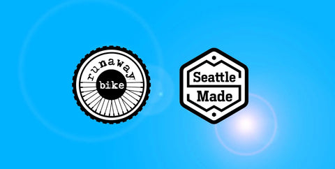 Low Odor Bike Degreaser For Chains And Parts Cleaners, logo with 'runaway bike' and 'Seattle Made' badges on blue background.