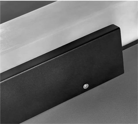 Close-up of the black base and LED section of the Modern Linear Wall Sconce Imitated Marble LED Wall Light,Warmth.