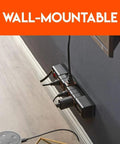Rotating Surge Protector Power Strip with Six Swivel Outlets and Two USB Ports, wall-mounted by desk, cables plugged, space saving design