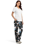 Woman wearing Plus Size Printed Nurse Scrub Pants for Women, machine washable and easy care, lightweight fabric with multiple pockets.