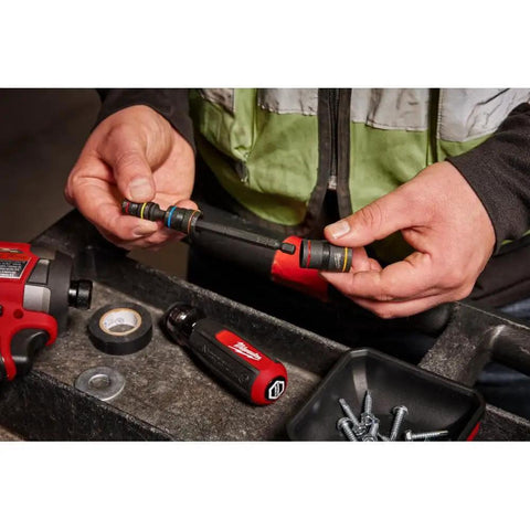 Person holding Multi Nut Driver Set With Shockwave Impact Rated One Quarter Inch Hex Shank Six Nut Drivers in workshop.