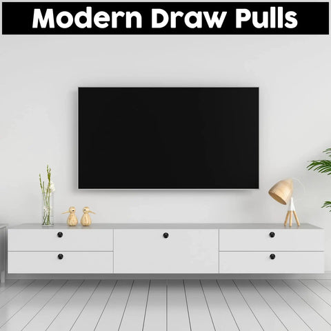 Modern living room setup with TV and drawer using 100 Count Matte Black Round Cabinet Knobs 1.18 Inch Drawer Knobs.