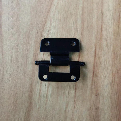 Cabinet hinge front view, black metal with two mounting holes and central pivot pin