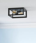 Two Light Flush Mount Ceiling Light Fixture In Industrial Black Metal Finish for kitchens and entryways, shown from below.