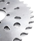 Close-up of Beefy CNC Aluminum Adapter with 40T Sprocket for 25mm or 38mm rear hubs on 49cc to 80cc two-stroke bicycles.