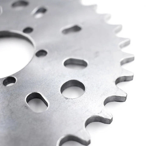 Close-up of Beefy CNC Aluminum Adapter with 40T Sprocket for 25mm or 38mm rear hubs on 49cc to 80cc two-stroke bicycles.