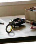Light Shielding Tape Blackout Tape for Monitors and Windows blocks light pollution on a desk with electronic tools