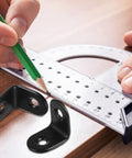Black L Shape Corner Brackets Set Of 18 With Screws Stainless Steel Right Angle Fasteners for DIY projects with tool on table