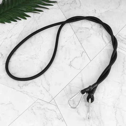 Four Pack Elastic Luggage Straps With Carabiner Hooks Black Polyester Tie Down Straps For Camping, RV, Motorcycle Gear, Tarp, And More, 1 Meter Each, Super Stretchy With Strong Rebound Ready To Roll displayed on marble surface.