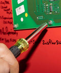 Hand using 14-In-1 Electronic Precision Screwdriver Kit With 8 Tips Slotted Phillips And Tamperproof Torx Bits on circuit board