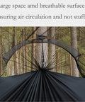 Ultra Lightweight Camping Hammock With Mosquito Net And Rainfly A Backpacker Ready Portable Sleeping Hammock Tent For Trail Trips And Outdoor Adventures Orange showing the mesh structure.