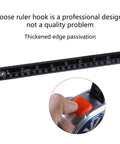 Rugged Steel Tape Measure With Handy Pocket Clip for Home Projects and Pro Craftwork showing loose hook and button detail.
