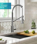 Heavy Duty Stainless Steel Pull Down Kitchen Faucet With Built In Water Filter in a modern kitchen setting with a hexagon backsplash.