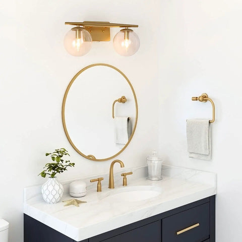 Gold Vanity Light 2-Light Fixture With Globe Clear Glass Shades For Bathroom, 16 Inch Length, over modern bathroom sink