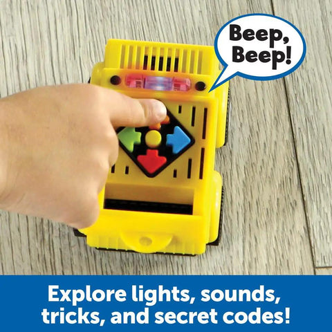 Switcheroo Coding Crew Screen Free Robot Kit For Kids Hands On Push Button Coding toy, yellow plastic, child pressing buttons
