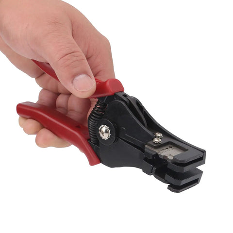 Heavy Duty Adjustable Wire Stripper Tool With Comfortable Grip Designed For Electricians And DIY Enthusiasts To Slice Cable Safely and Make Your Home Projects A Breeze Without Ruining The Wires, held in hand.