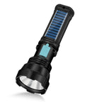 Solar Powered 1500 Lumen Flashlight Handheld For Camping Survival And Emergencies showing solar panel on handle
