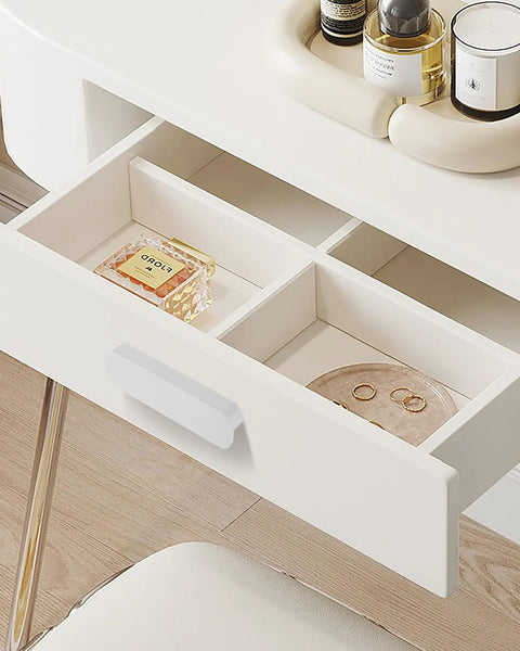 Open drawer with matte white kitchen cabinet handle installed, showing organized compartments with perfumes and jewelry.