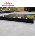 Plug And Play 4x5 Industrial Floor Scale With Bright Digital Indicator Heavy Duty 1000 Lb Pallet Scale top view of steel platform in warehouse