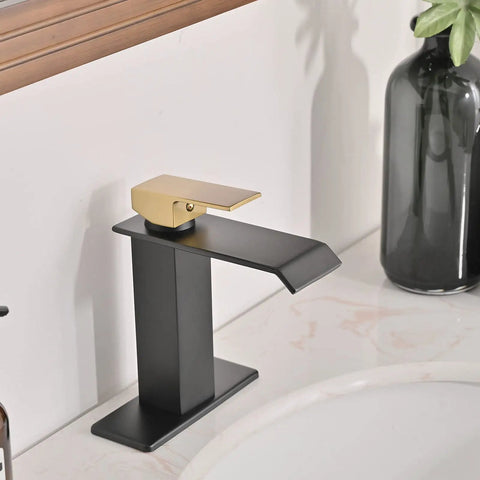 Matte Black Bathroom Faucet With Modern Waterfall Design, Single Hole Sink Faucet on marble vanity top