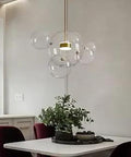 Sleek Modern LED Globe Pendant Chandelier With Six Clear Bubble Glass Orbs, 21.65 Inch Hanging Light Above Dining Table