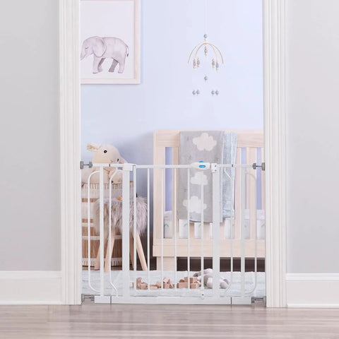 Extra Wide Baby Safety Gate For Openings From 29 To 41.5 Inches, 30 Inches Tall, mounted in nursery doorway, white color