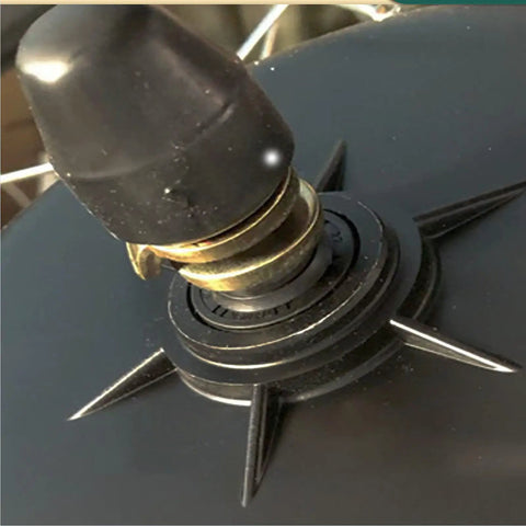 Close-up of a valve and black rubber washer from the Built Tough And Dead Reliable 14mm Screw Kit For E Bike Hub Motor.