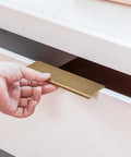 Installing Champagne Bronze Edge Finger Pull Cabinet Handles 5 Inch Center 128mm Flat Concealed Mount Aluminum Alloy on drawer.
