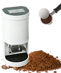Built Different Automatic Electric Coffee Tamper Secures 58mm Portafilters Fast With Adjustable Pressure Ranges And Quick Tap Feature For Barista Level Pulls Daily next to ground coffee.