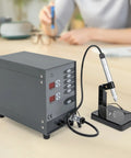 110V Pulse Arc Jewelry Welder Kit for DIY Repairs 100W Spot Weld Machine on a table next to eyeglasses