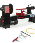 Top Shelf Benchtop Wood Lathe Pumping Solid Power Inside A Roomy Base Perfect For Weekend Woodworkers Craving Smooth Variable Speed Adjustment Third Horsepower Motor with tools.