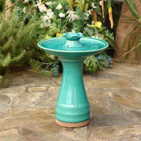 22 Inch Ceramic Bird Bath Fountain With Lotus Design, freestanding in a garden setting, Aqua Green glazed and weather-resistant