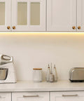 Kitchen with white cabinets featuring 24 Pack 1 Inch Round Solid Vintage Antique Brass Cabinet Knobs Pulls For Cabinets And Drawers With Screws Included Ball Knobs Cabinetry Hardware For DIY Home Makeovers On Cabinets, Dressers, And Furniture.