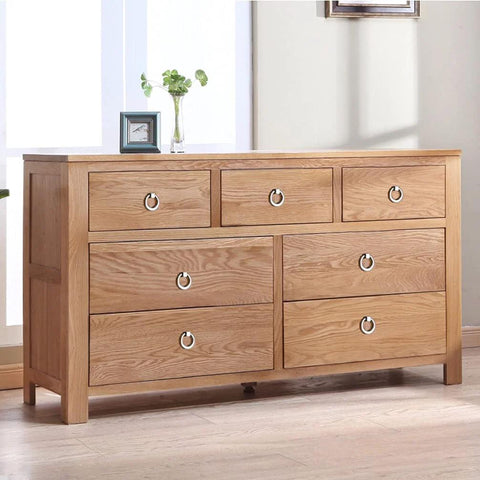 Wooden dresser with 6 Pack Brushed Nickel Ring Drawer Pulls Stainless Steel Cabinet Handles for Kitchen Cabinets and Furniture.