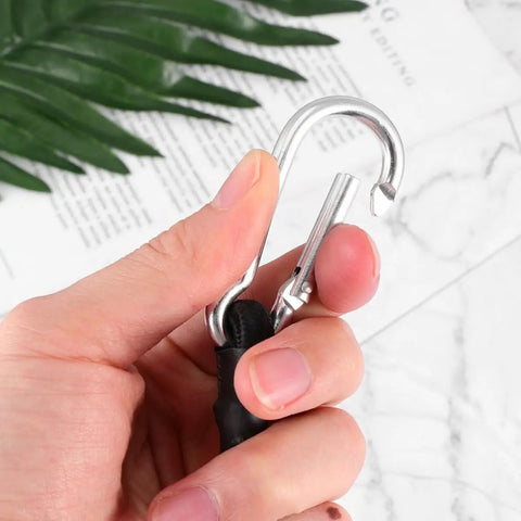 Close-up of carabiner hook on Four Pack Elastic Luggage Straps With Carabiner Hooks Black Polyester Tie Down Straps For Camping, RV